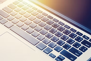 Computer keyboard representing linked sales and purchase order processing