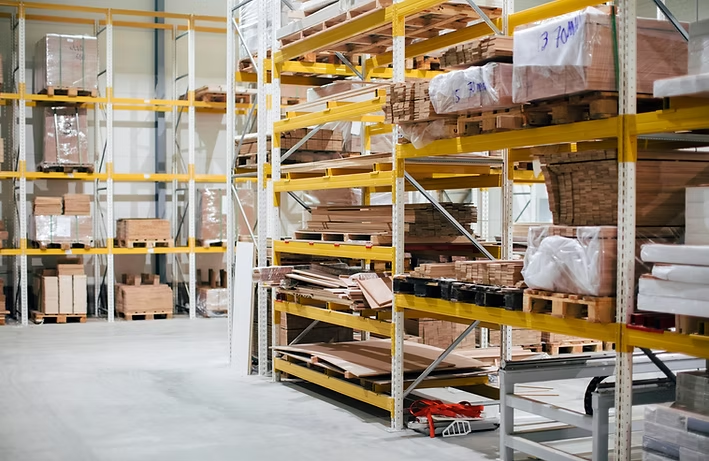 Warehouse shelving holding stock in multiple storage locations